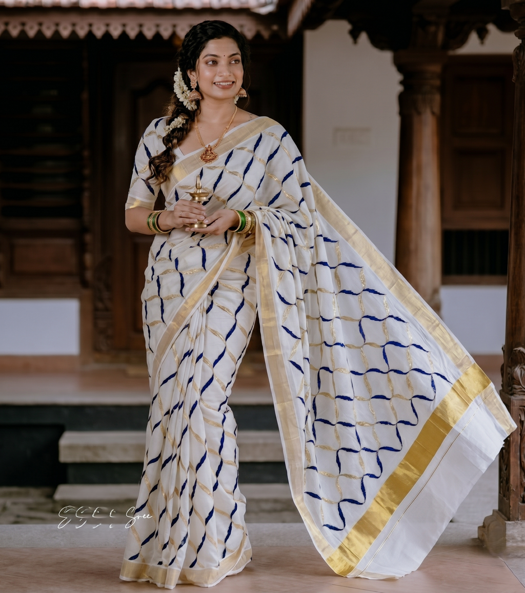 Geometric printed golden zari weaved kerala cotton saree
