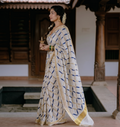 Geometric printed golden zari weaved kerala cotton saree