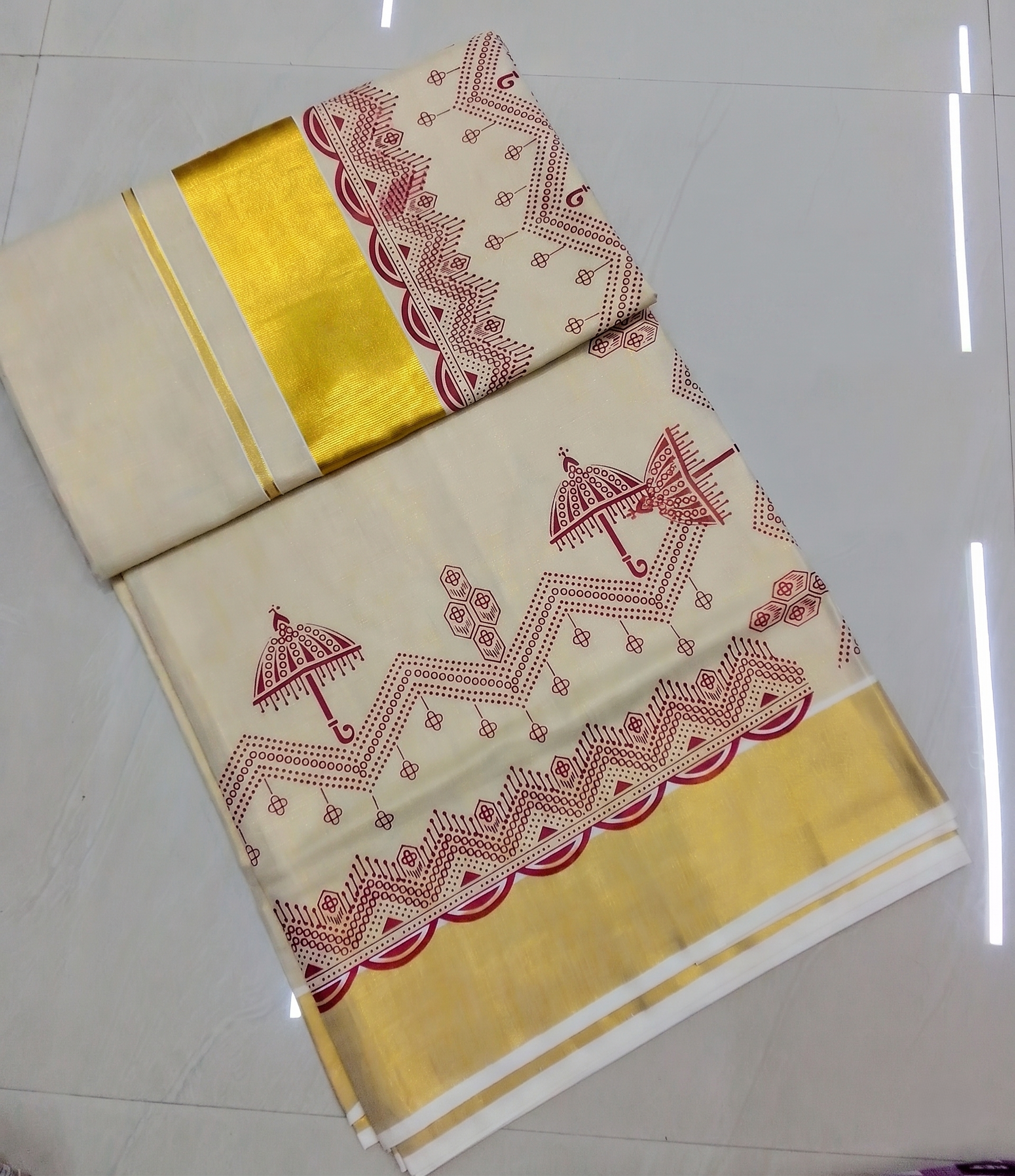 Pooram Kuda Motif Printed Kerala Tissue Cotton Saree with Zari Border
