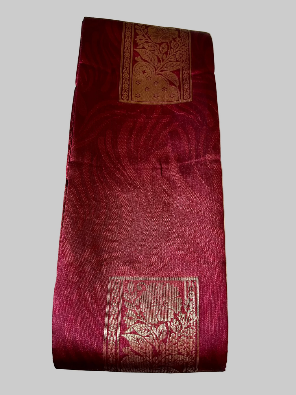 Solid Maroon with golden zari Buta and Pallu Soft Silk Saree