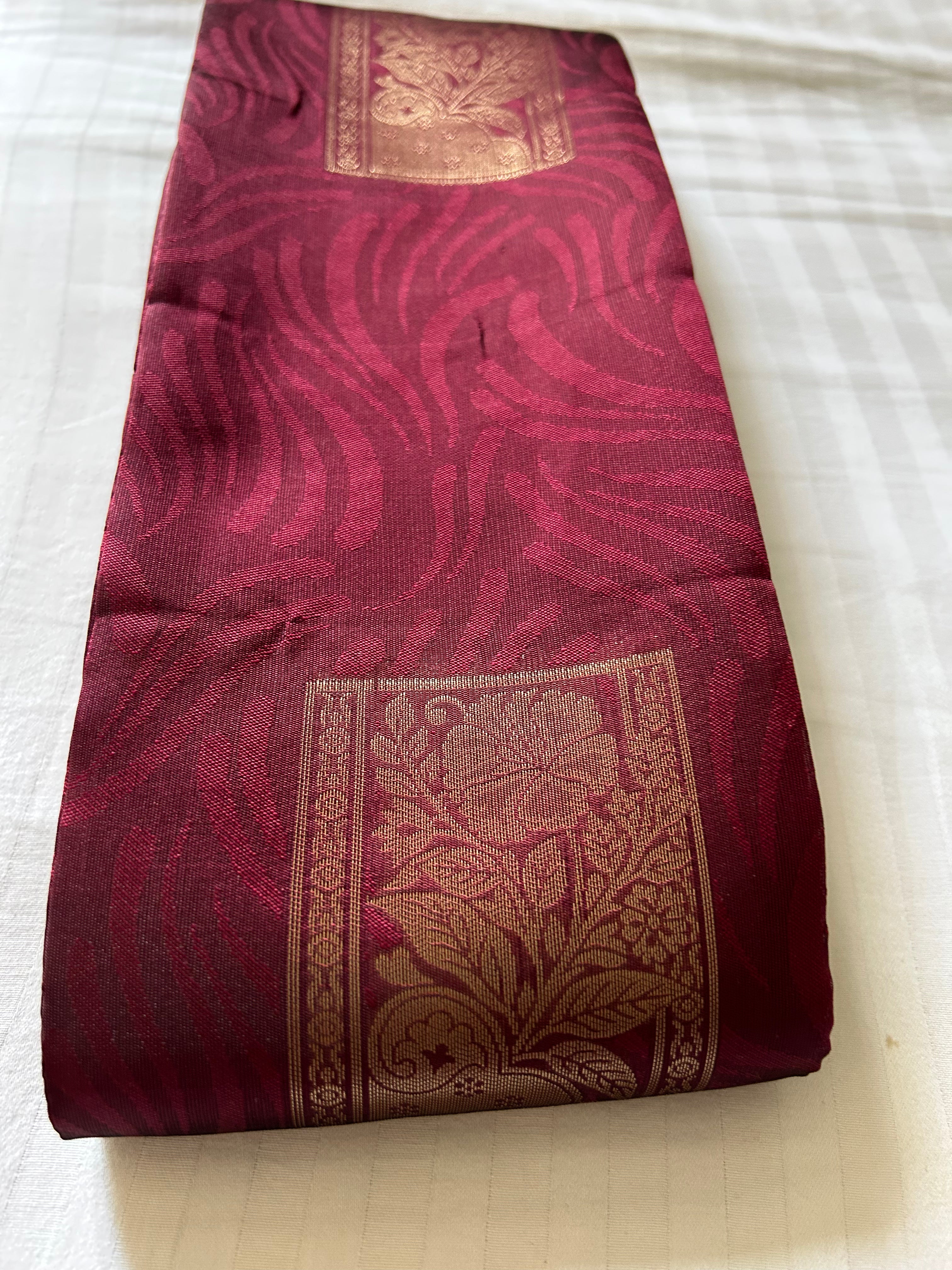 Solid Maroon with golden zari Buta and Pallu Soft Silk Saree