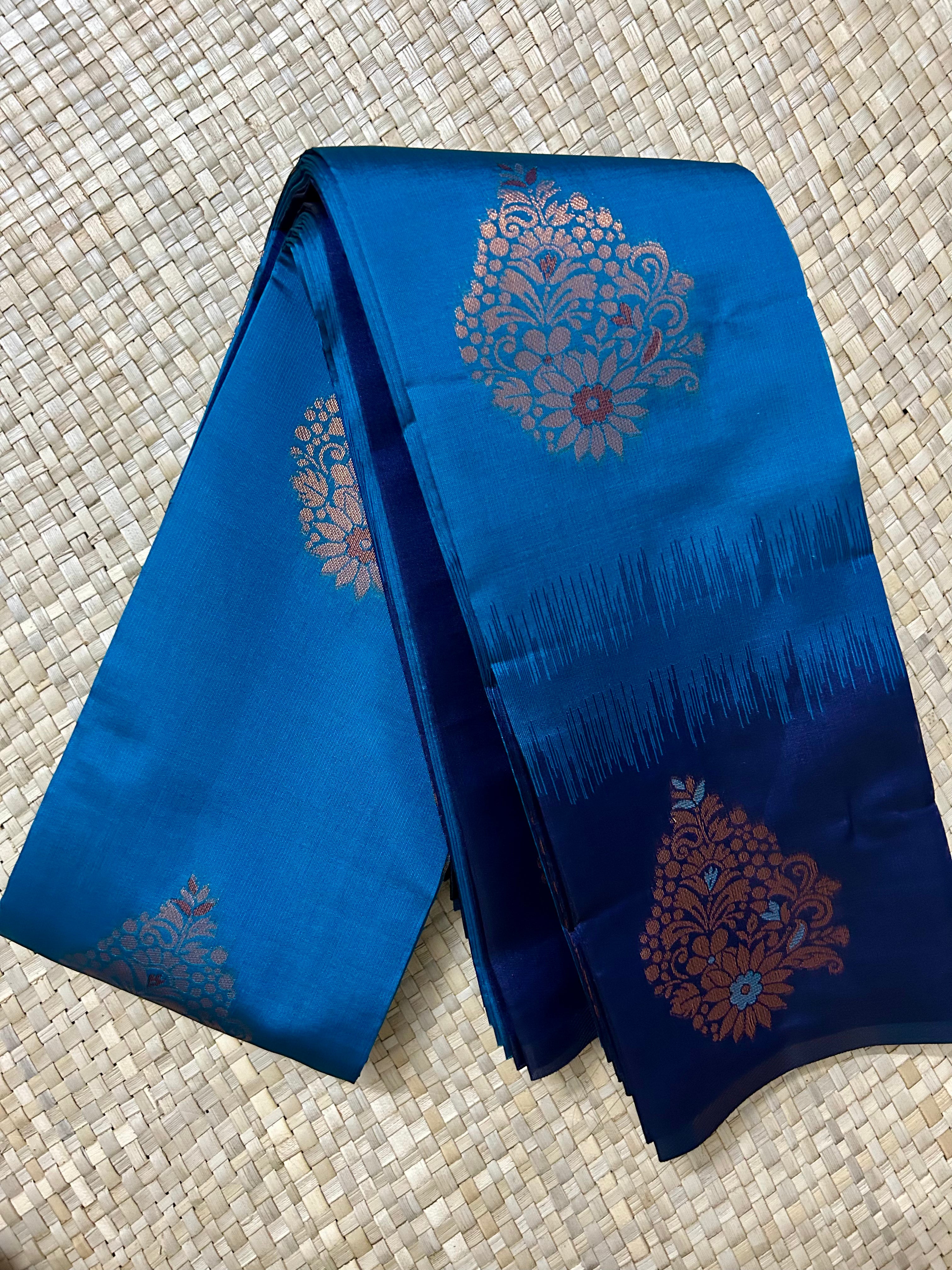 Peacock blue with Copper Zari woven Pallu Semi Silk Saree