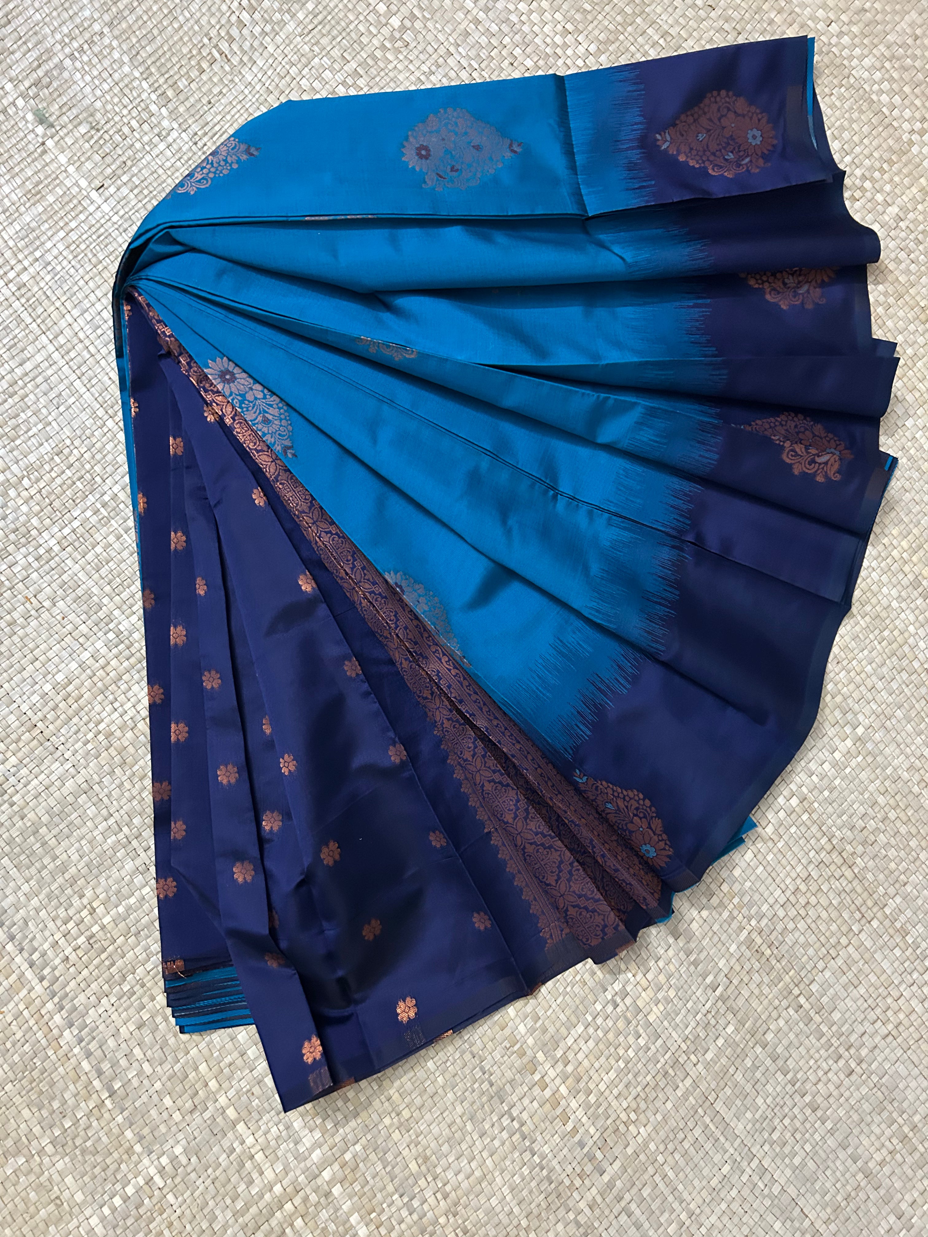 Peacock blue with Copper Zari woven Pallu Semi Silk Saree