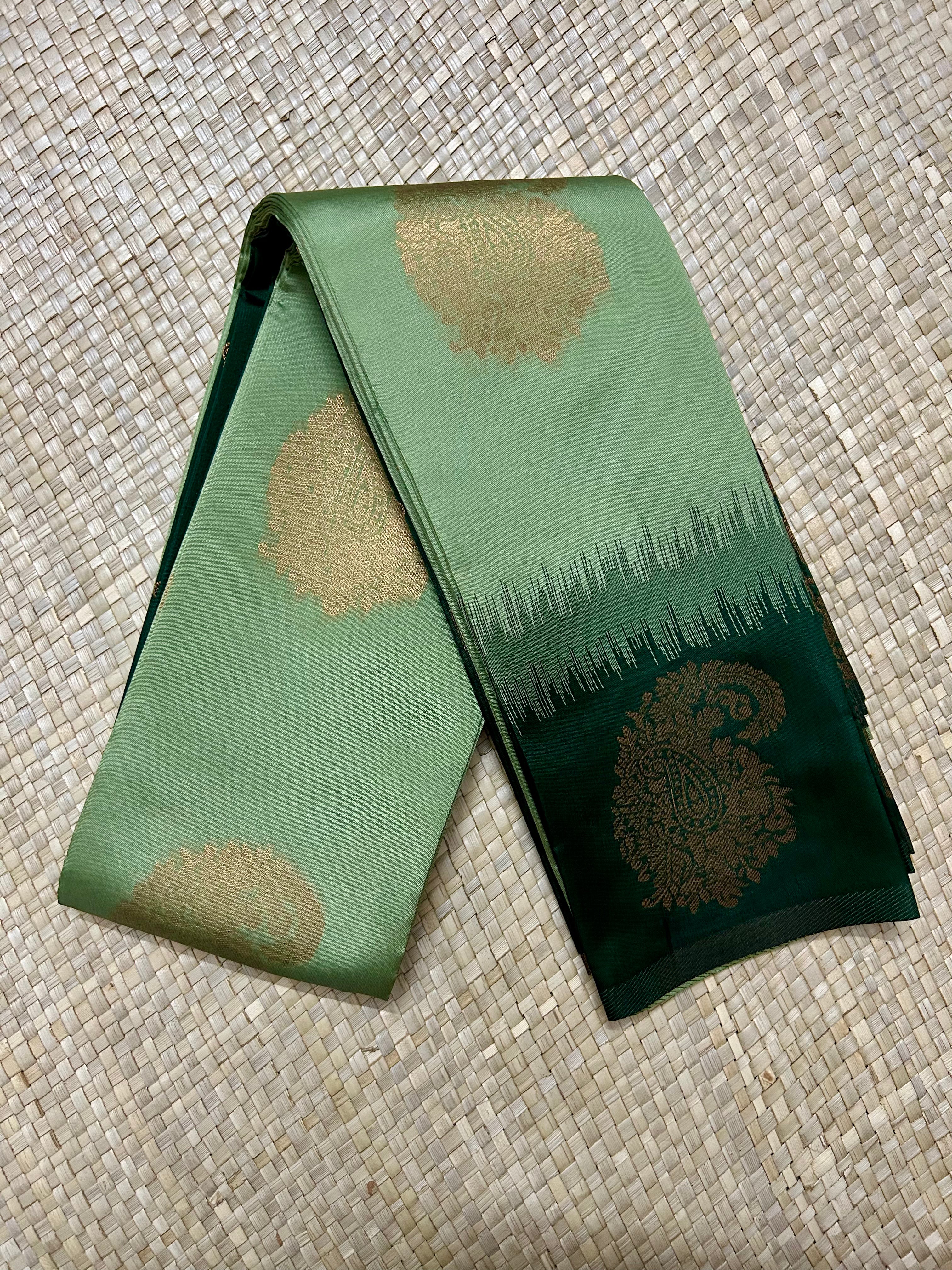 Shades of Green with Zari woven Motifs & Pallu Semi Silk Saree
