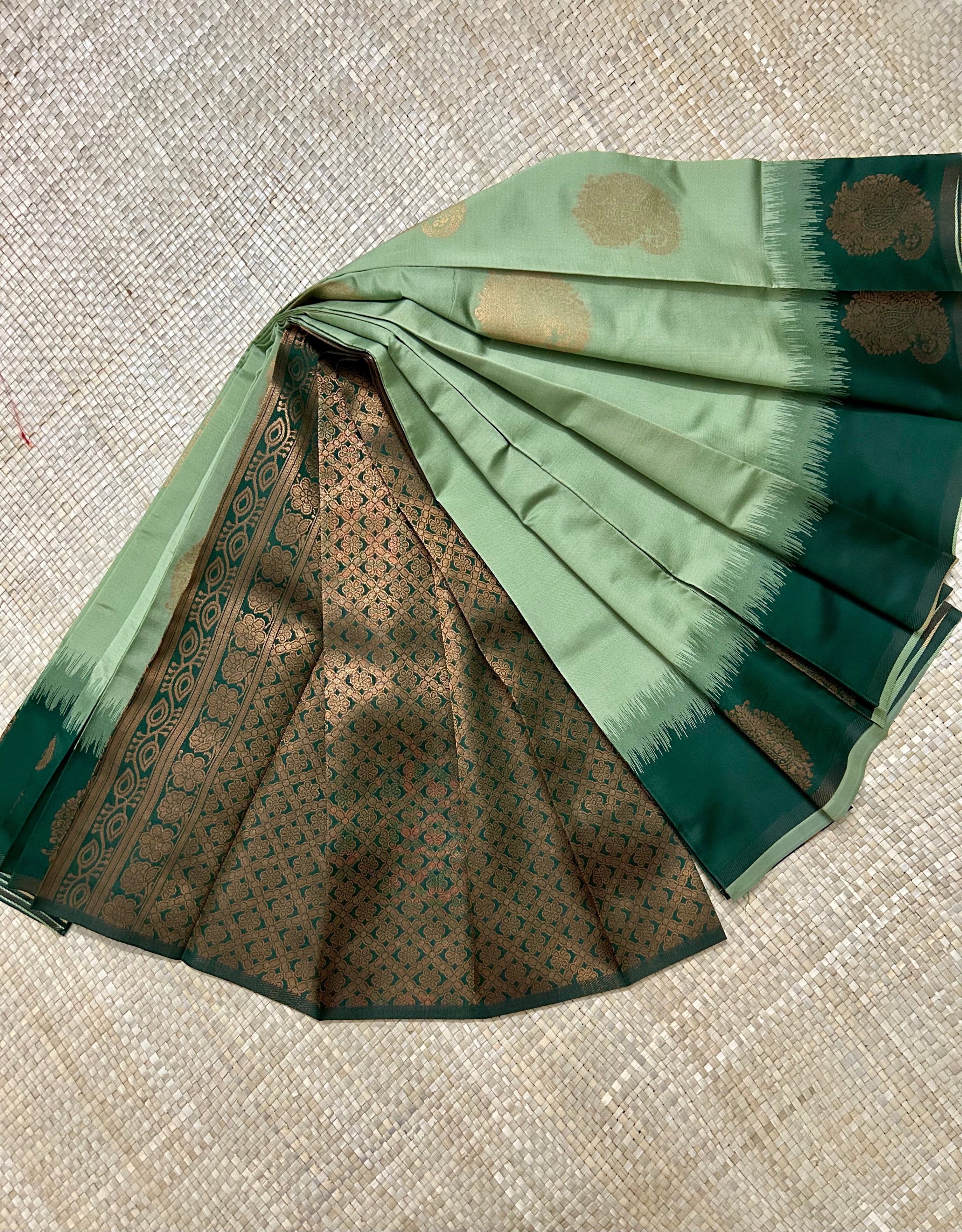 Shades of Green with Zari woven Motifs & Pallu Semi Silk Saree